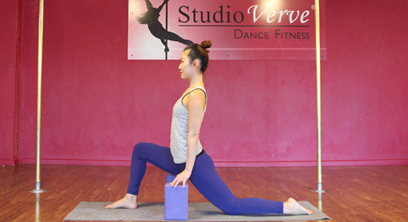 Student Nadine demonstrates a basic Hip Flexor Stretch