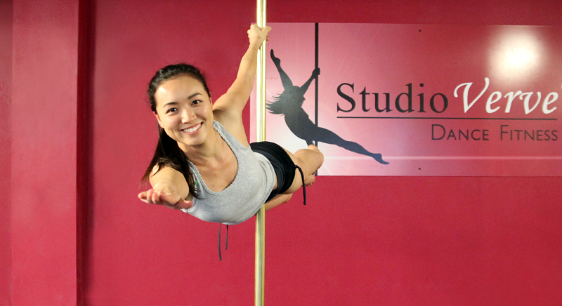 Level 7 student Joanne holding a Superman pose