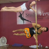 Josh and Wesley from PoleFit Men Beginners in a double flag!